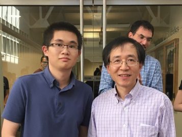 Professor Xuming He awarding Jiashen Lu an Outstanding first year Master's student award for the 2015-2016 academic year 